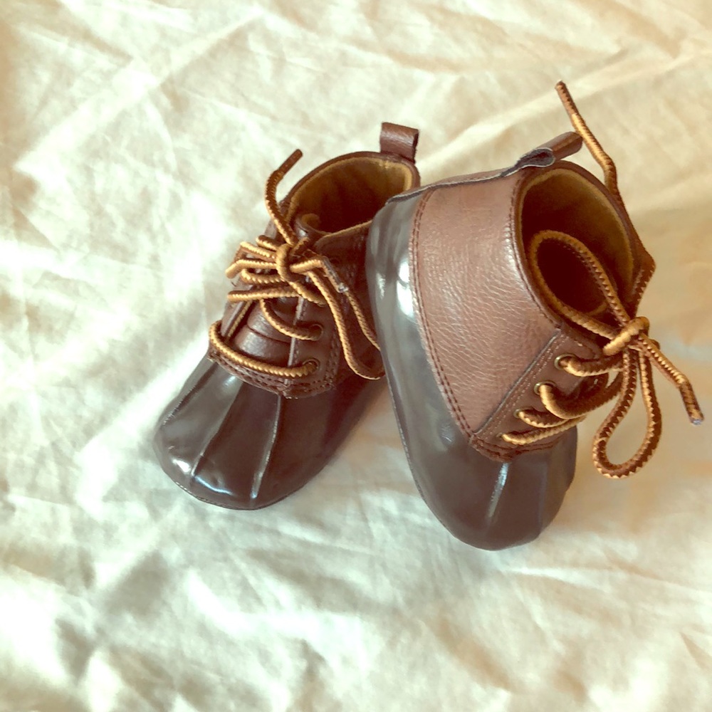 By: Trim-foot boy baby shoes.